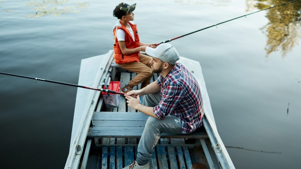 Two men in a small boat fishing