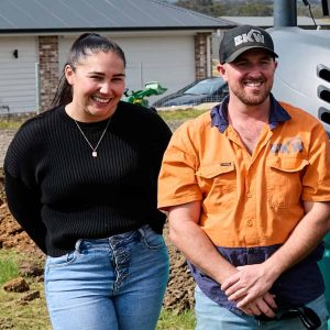 two BKW Earthworks employees smiling and engaged
